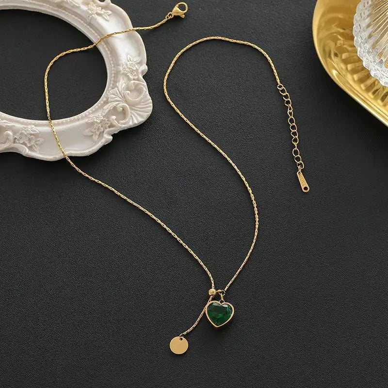 Elegante gouden ketting met subtiele hangende schijf