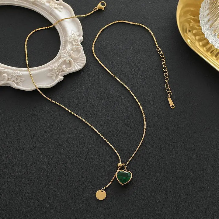 Elegante gouden ketting met subtiele hangende schijf