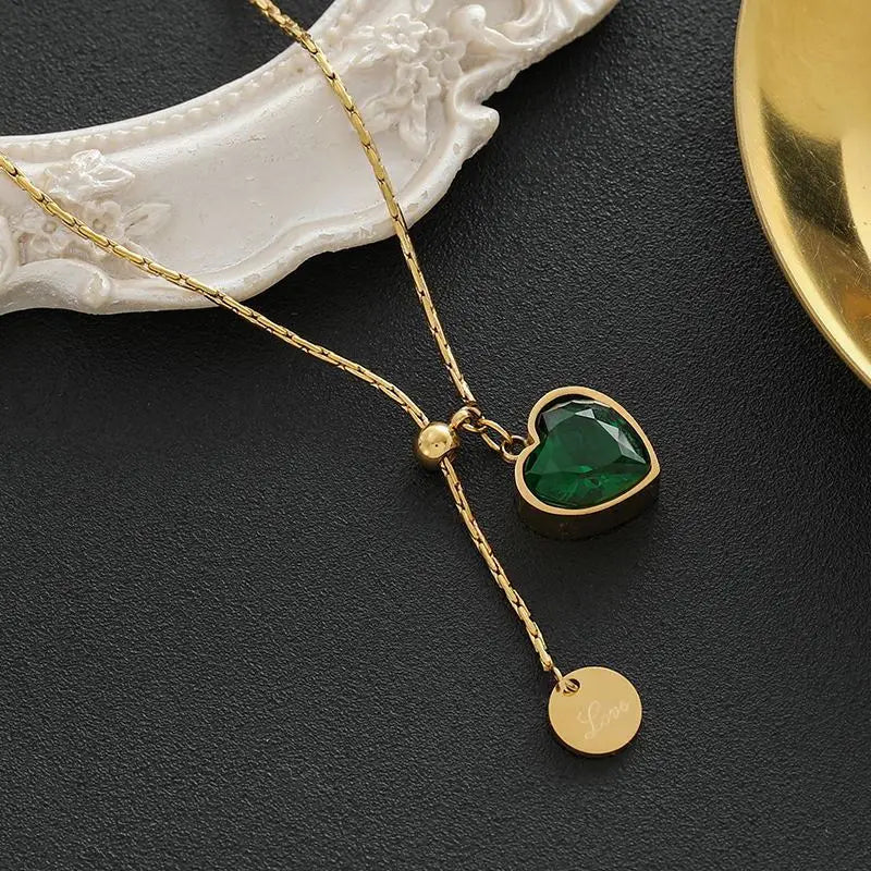 Elegante gouden ketting met subtiele hangende schijf