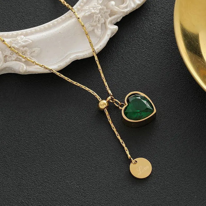 Elegante gouden ketting met subtiele hangende schijf