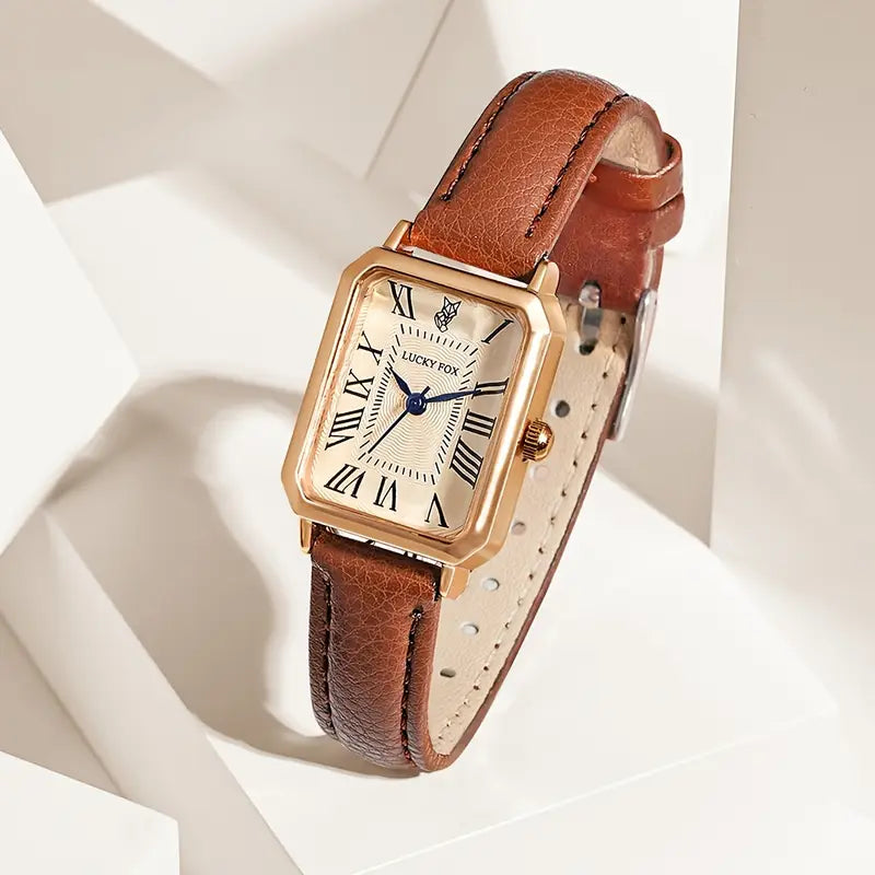 Elegante gouden horloge met een verfijnd steentje.
