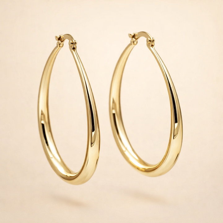 Stijlvolle gouden oorringen met gladde afwerking