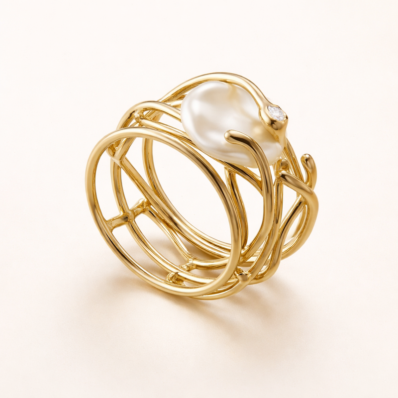 Elegante gouden ring met parel en verfijnd detail