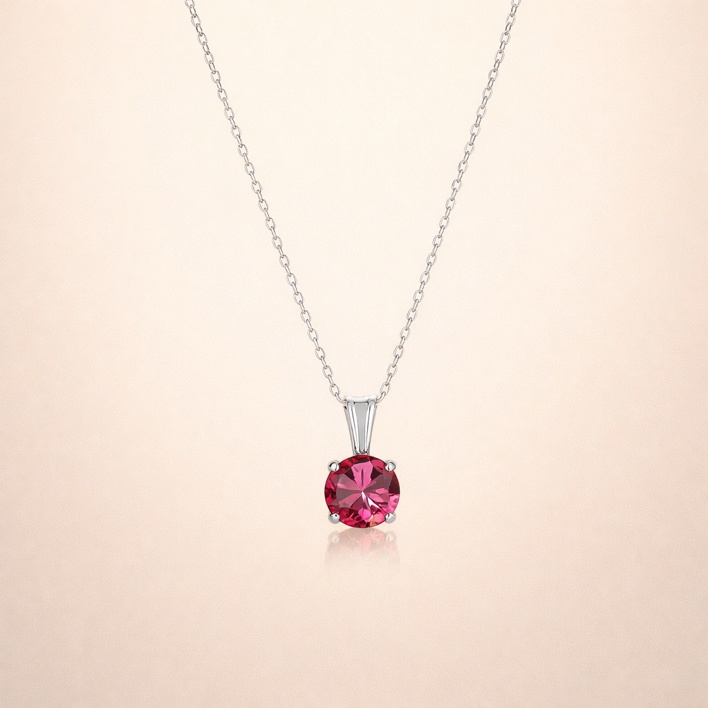 Elegante ronde robijn ketting in wit goud
