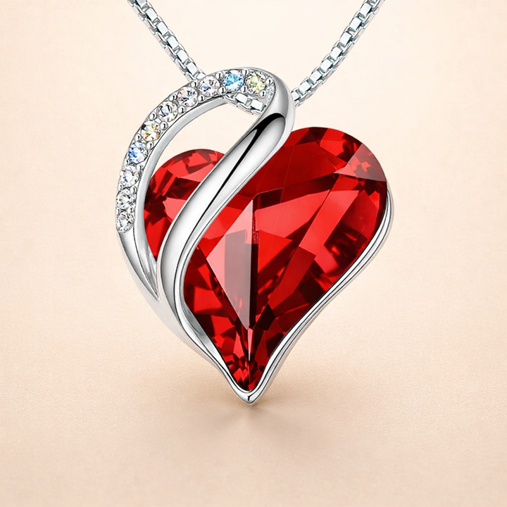 Eindeloze liefde ketting van wit goud met robijnaccent