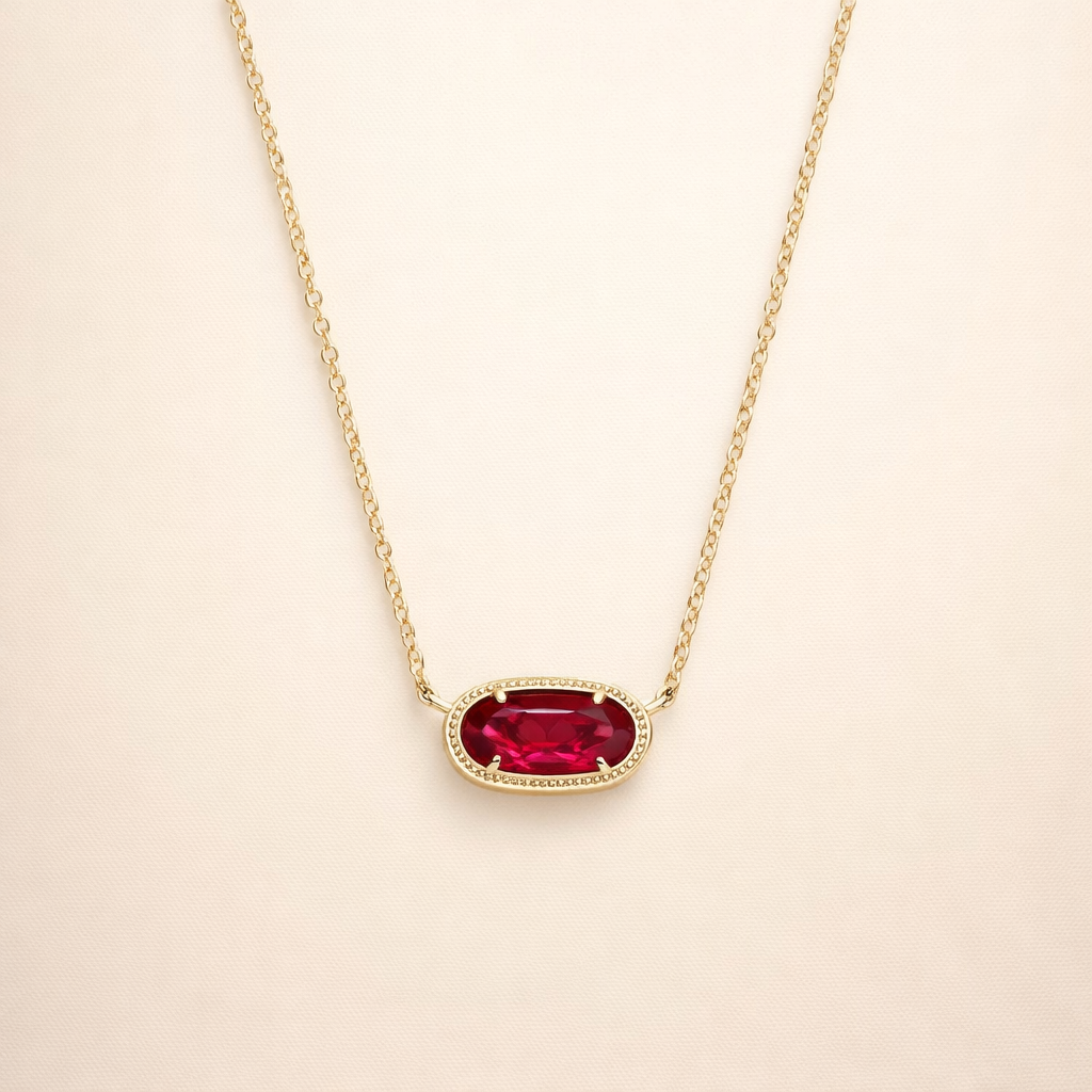 Elegante gouden ketting met ovale robijn