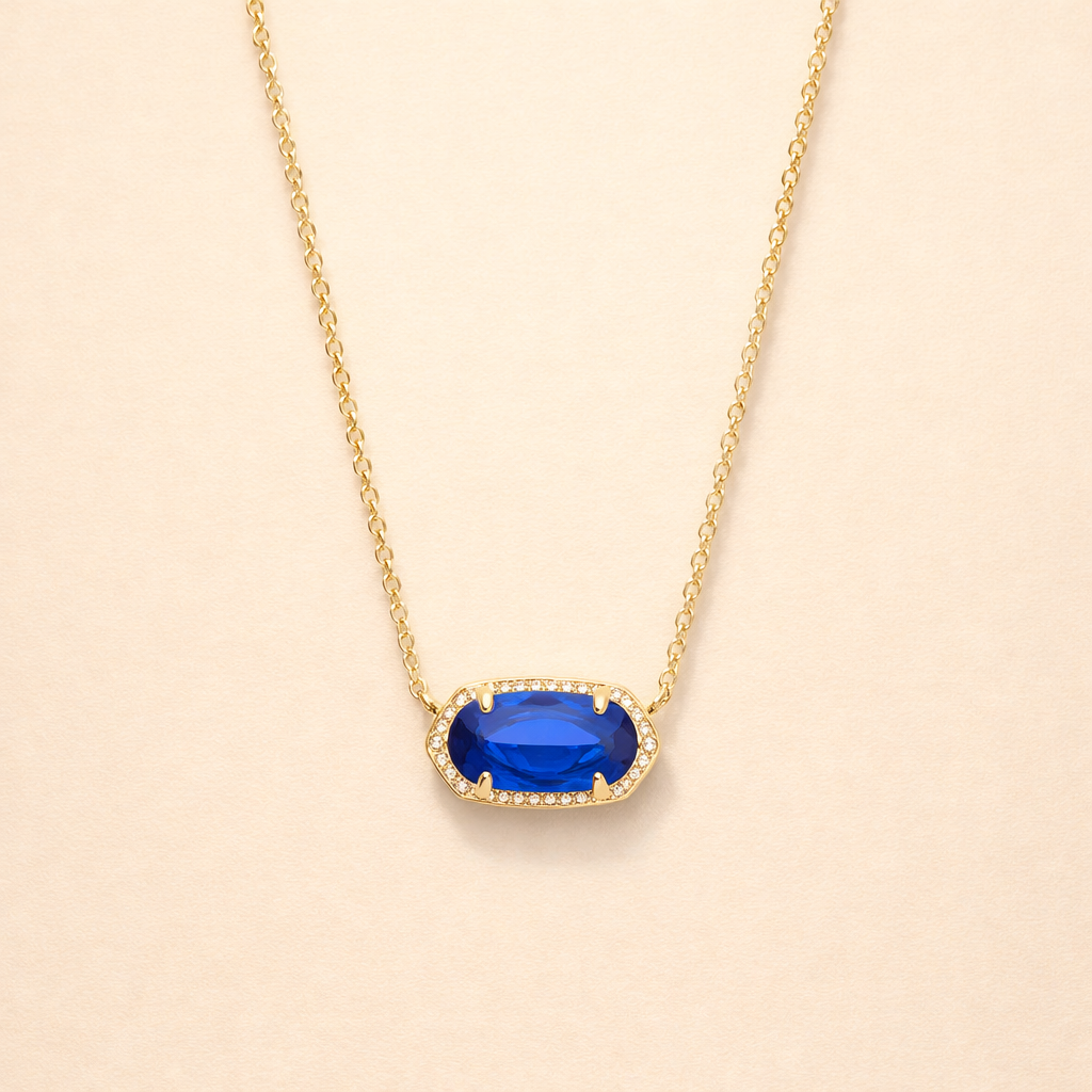 Elegante gouden ketting met ovale saffier