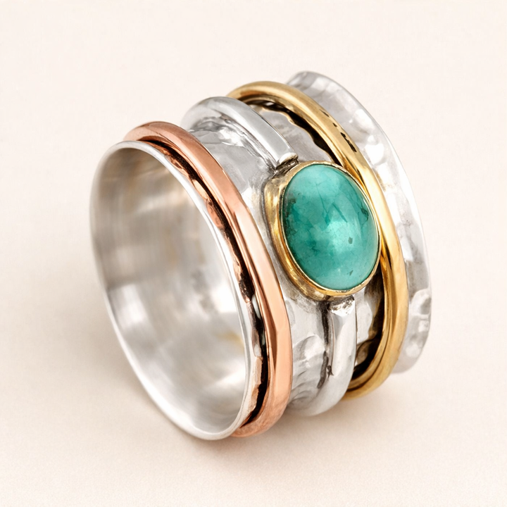 Elegante gouden ring met turkoois en verfijnde details