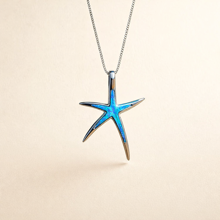 Zilveren ketting met blauwe opal en zeester detail
