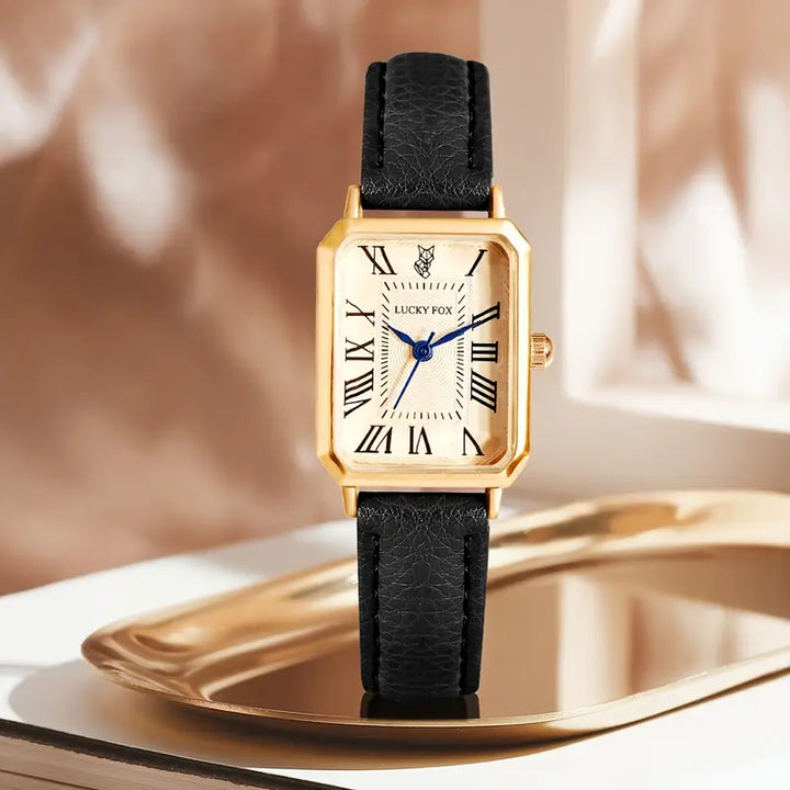 Elegante gouden horloge met een verfijnd steentje.