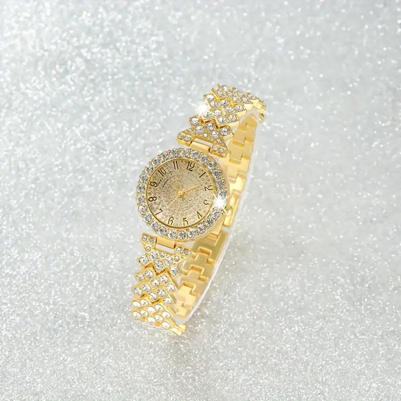 Elegante gouden horloge met subtiele schakelstructuur