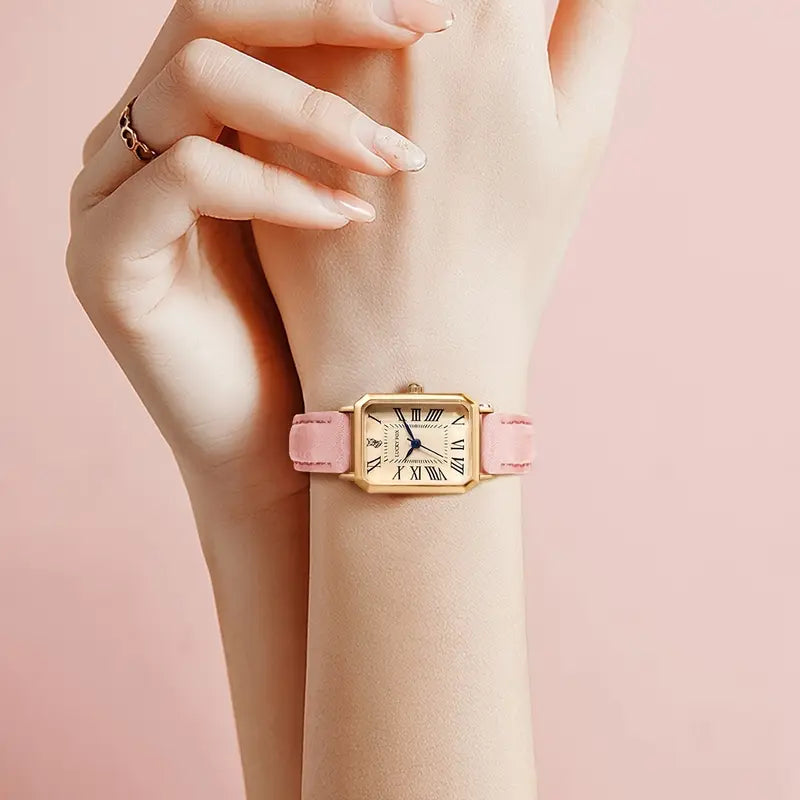 Elegante gouden horloge met een verfijnd steentje.