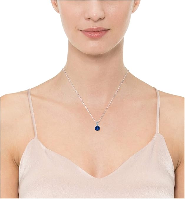 Elegante witgouden ketting met ronde geslepen saffier