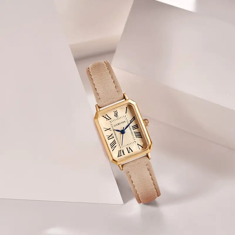 Elegante gouden horloge met een verfijnd steentje.