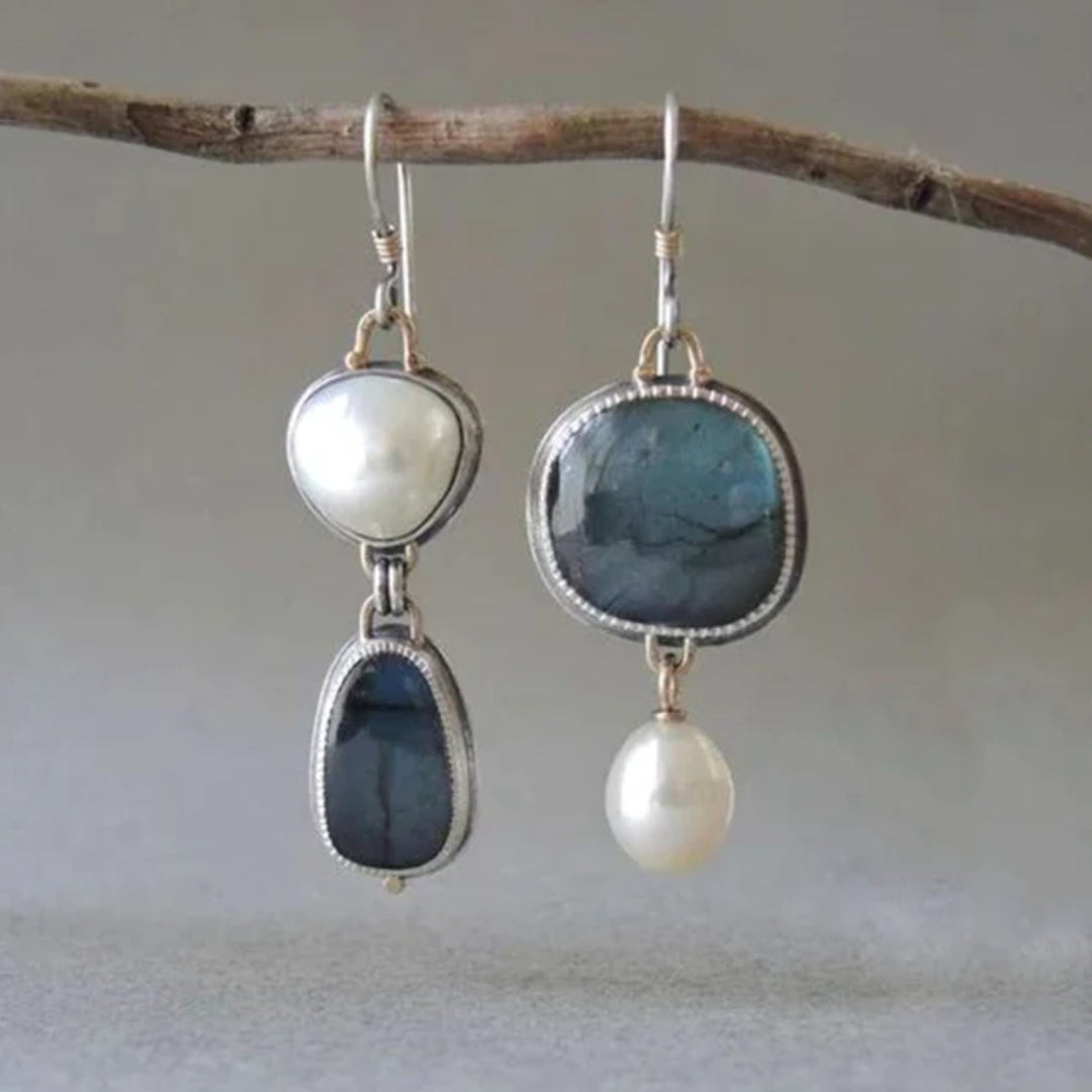 Elegante oorbellen met blauwe steen en parel