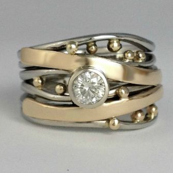 Elegante gouden ring met zirkonia in vintage stijl