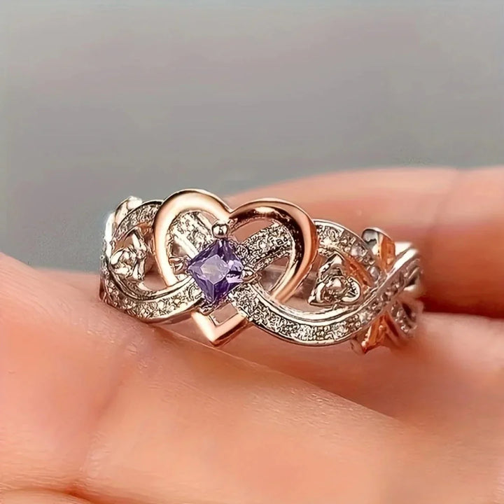 Elegante gouden en zilveren ring met hartje