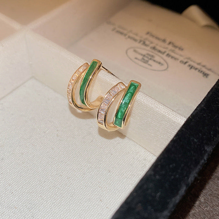 Elegante gouden oorbellen met bladeren