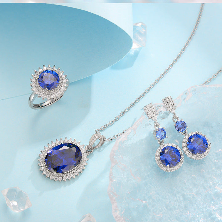 Elegante witte gouden ketting met blauwe zirkonia