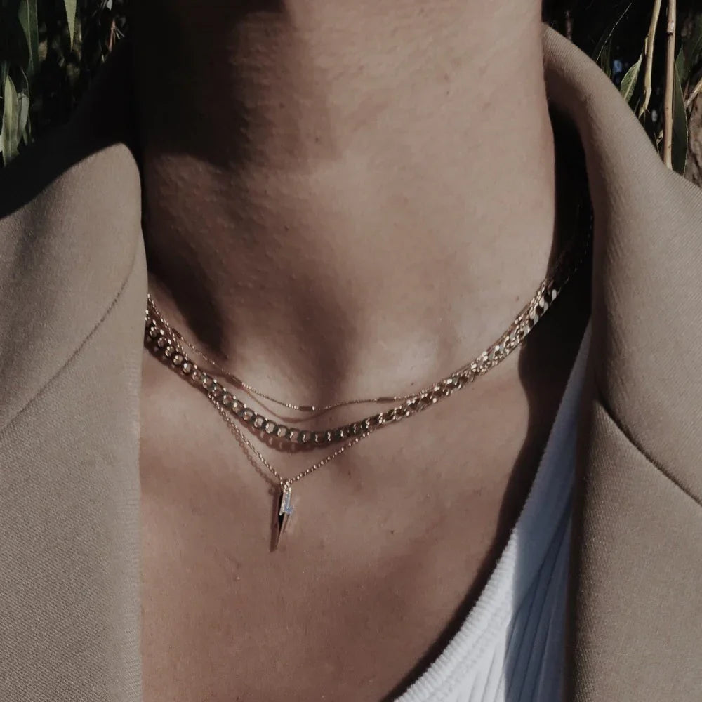 Elegante platte schakel ketting in wit goud