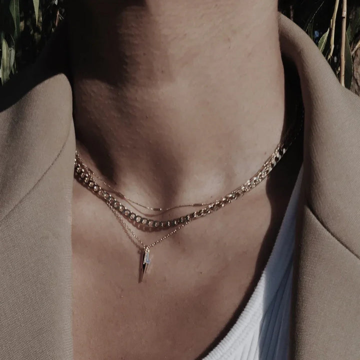 Elegante platte schakel ketting in wit goud