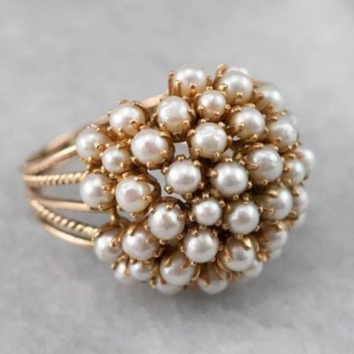 Elegante ring met ingelegde parels in zilver