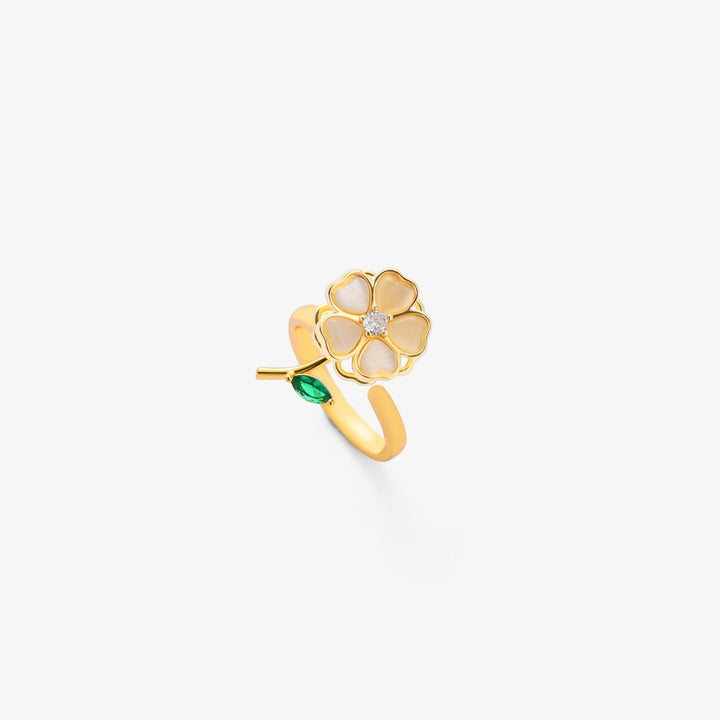 Elegante gouden ring met draaiend bloemmotief