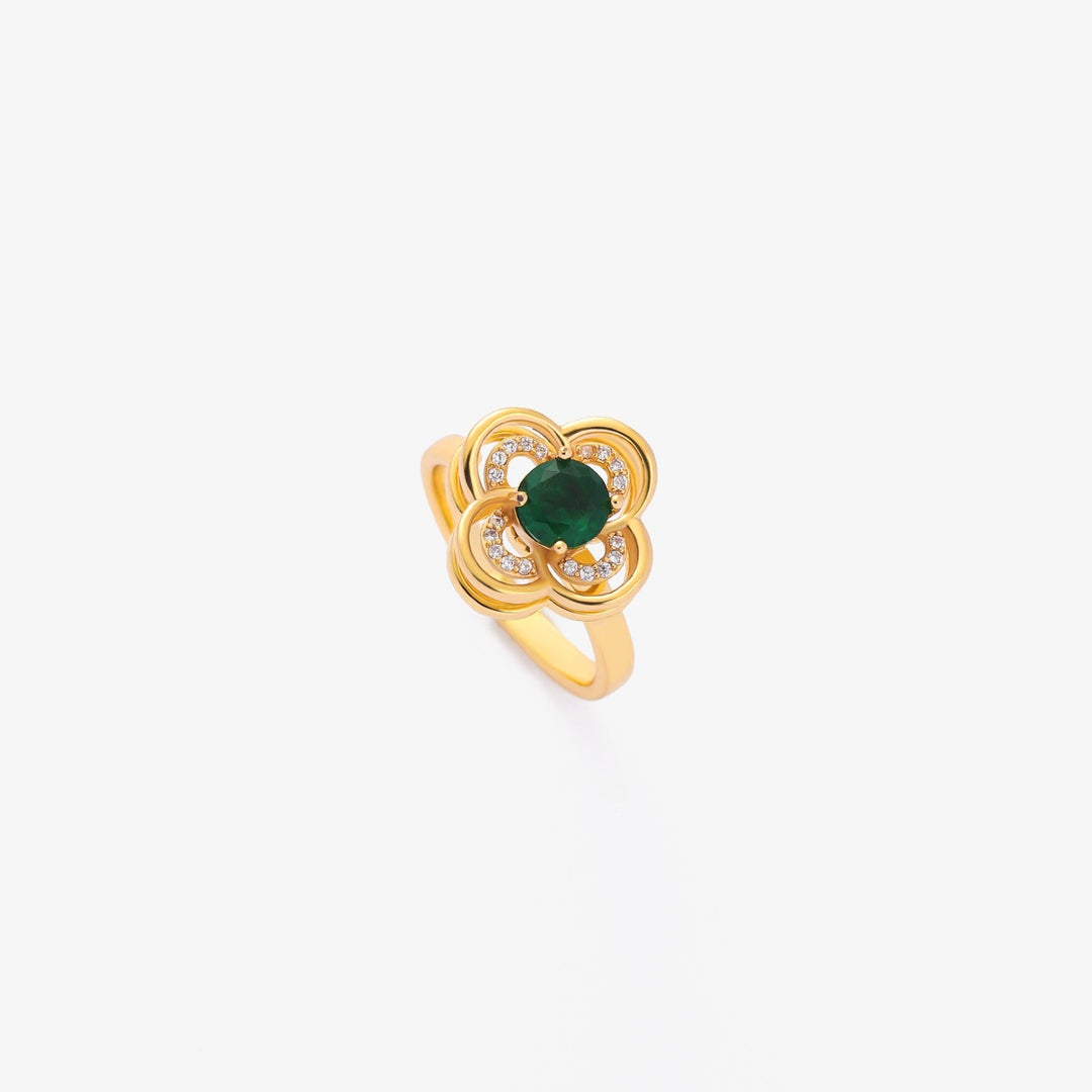 Elegante gouden ring met smaragd en klavertje vier
