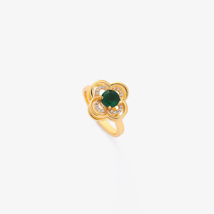 Elegante gouden ring met smaragd en klavertje vier