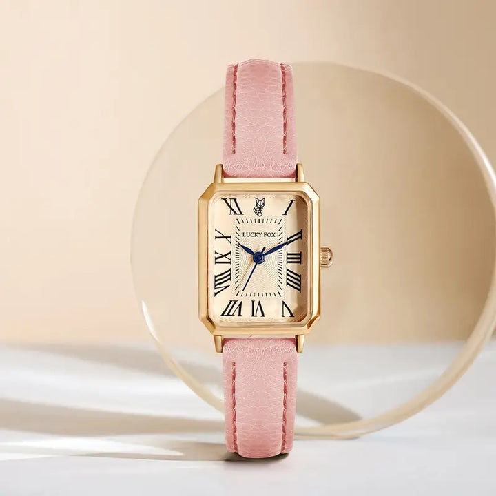 Elegante gouden horloge met een verfijnd steentje.