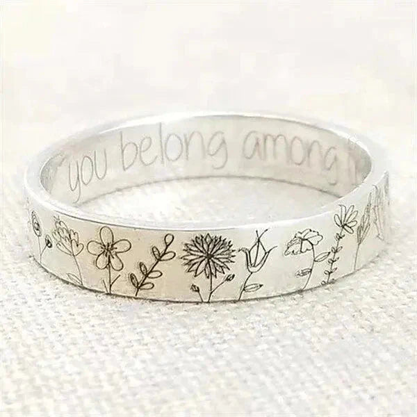 Zilveren ring met paardenbloemdesign