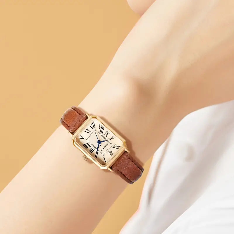 Elegante gouden horloge met een verfijnd steentje.