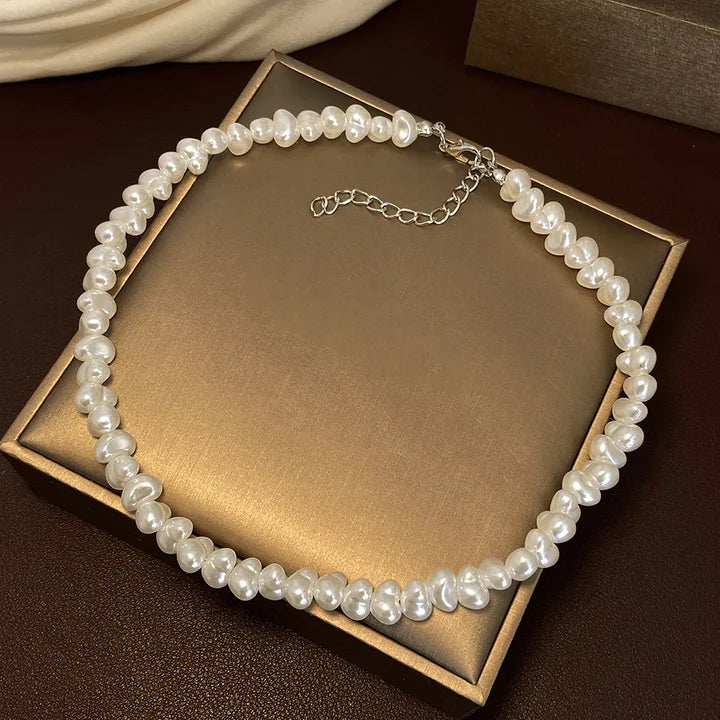 Eenvoudige witgouden ketting met parel