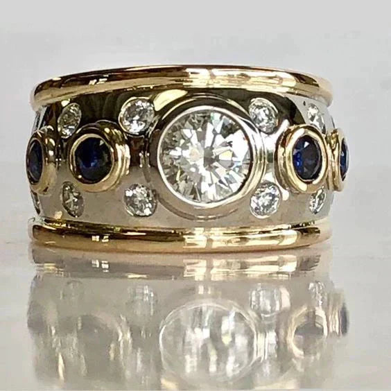 Vintage brede gouden ring met stenen