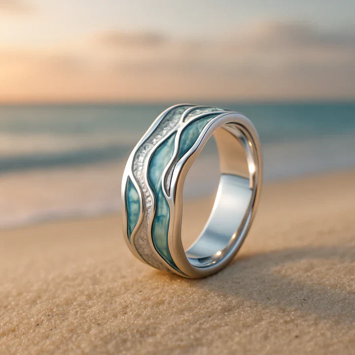 Zilveren ring met golvend design en turquoise accenten