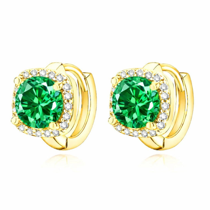 Elegante gouden oorbellen met smaragddetail