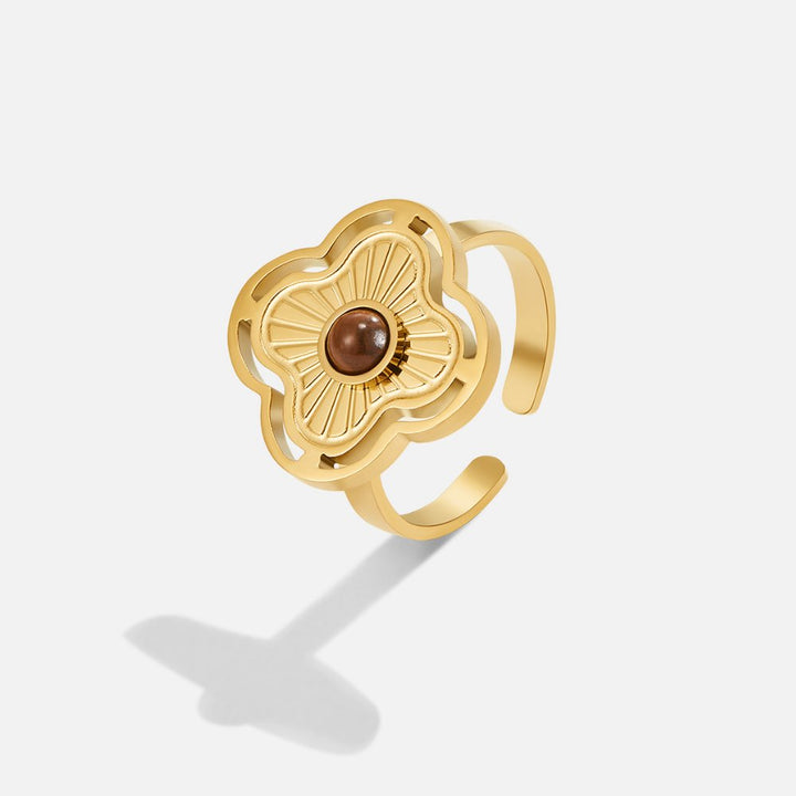 Zilveren ring met tigeroog en delicate bloemenmotieven